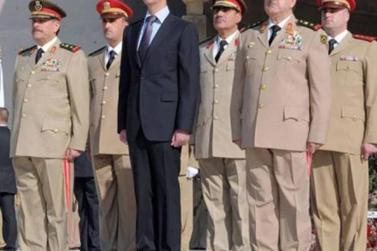 Bashar al Assad negou acusações de violência contra o povo e afirmou que as forças policiais não estavam armadas (AFP)