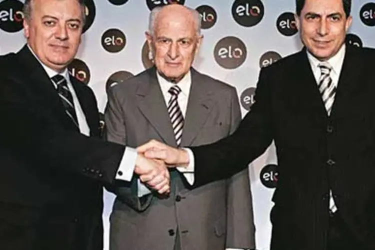 Bendini, presidente do BB; Brandão e Trabuco, ambos do Bradesco: eles criaram um cartão para as classes D e E