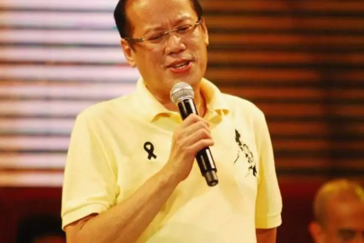 
	Benigno Aquino: a visita &eacute; a primeira de um presidente filipino ao quartel do FMLI depois da que foi realizada em 2000
 (Dondi Tawatao/Getty Images)