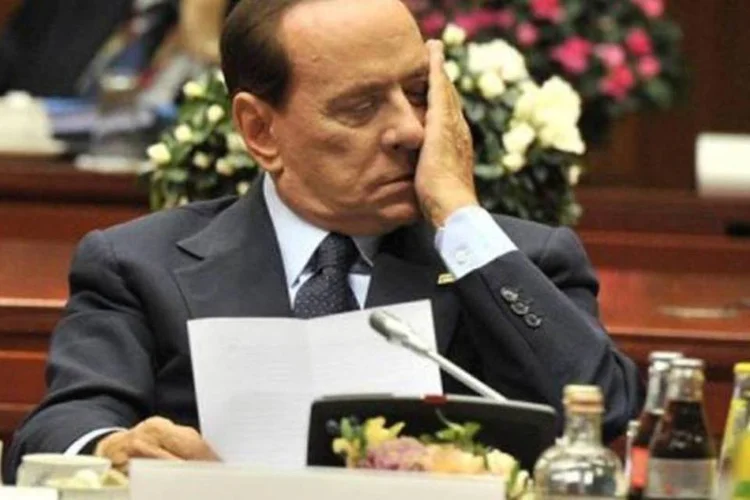Berlusconi depende apenas da aprovação da Câmara para deixar o governo (Georges Gobet/AFP)