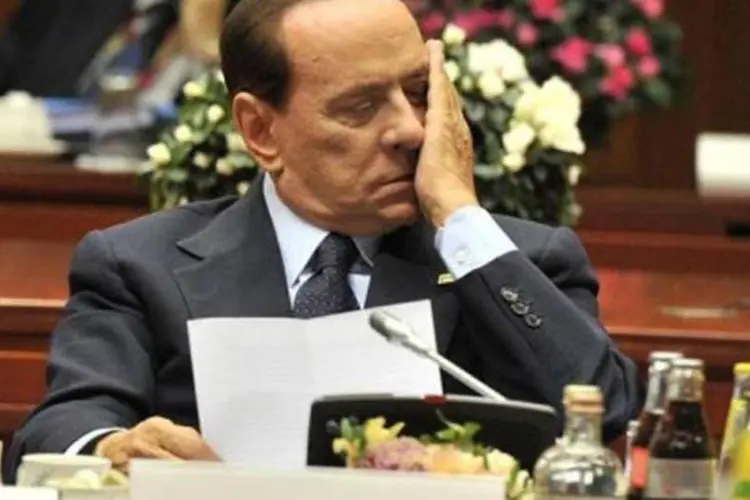 A saída de Berlusconi pode não ser suficiente para salvar a Itália, dizem especialistas (Georges Gobet/AFP)