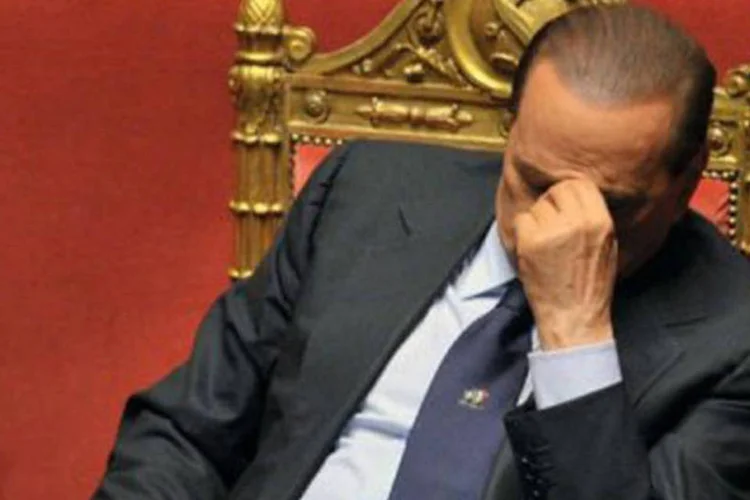 "Meu coração chora sangue por ter metido as mãos dentro dos bolsos dos italianos" disse Berlusconi sobre o plano (Alberto Pizzoli/AFP)