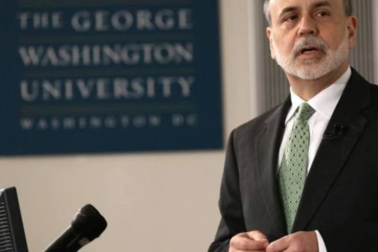 
	Bernanke disse que o ritmo de compras de ativos pode ser reduzido &quot;um pouco mais rapidamente&quot; se as condi&ccedil;&otilde;es econ&ocirc;micas melhorarem mais r&aacute;pido que o esperado
 (Win McNamee/Getty Images)
