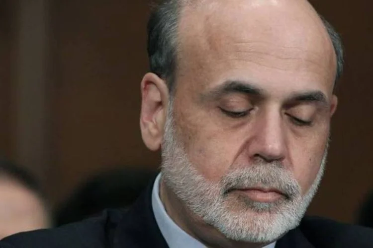 
	Bernanke de olhos fechados: investidores esperavam para ver se o chairman do Federal Reserve, Ben Bernanke, dar&aacute; sinais claros de mais afrouxamento monet&aacute;rio
 (Mark Wilson/Getty Images)