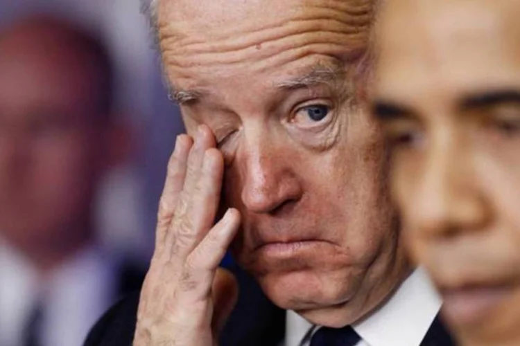 O presidente norte-americano Barack Obama e o vice Joe Biden, ao fundo (Chip Somodevilla/Getty Images)