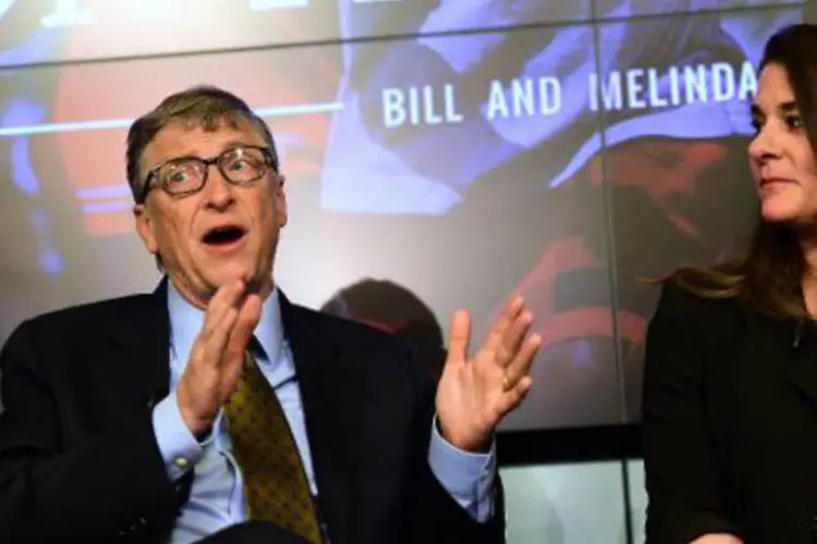 O casal Bill e Melinda Gates: tecnologia digital vai tirar milhões de pessoas da pobreza, segundo eles (Emmanuel Dunand/AFP)