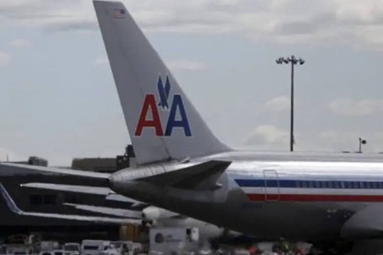 
	Avi&atilde;o da American Airlines: diretores da controladora planejam reavaliar uma alian&ccedil;a com a rival ante um plano alternativo para sair da concordata sozinha
 (Allison Joyce/Getty Images/AFP)