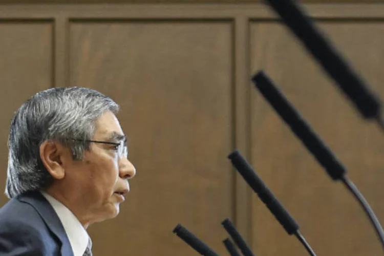 
	O presidente dp Banco do Jap&atilde;o (BoJ), Haruhiko Kuroda: &quot;n&atilde;o acredito que os decl&iacute;nios do iene est&atilde;o causando danos severos &agrave; economia japonesa&quot;
 (REUTERS / Yuya Shino)