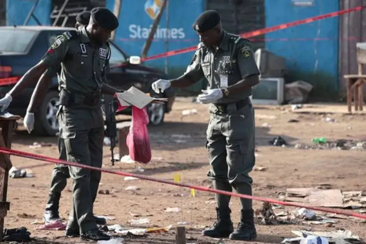 
	Atentado: as explos&otilde;es de hoje foram causadas por duas mulheres que se imolaram no mercado
 (REUTERS/Afolabi Sotunde)