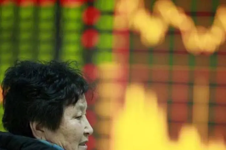 China: medida do governo tenta reduzir o risco de uma desaceleração econômica acentuada (AFP/ Str/AFP)