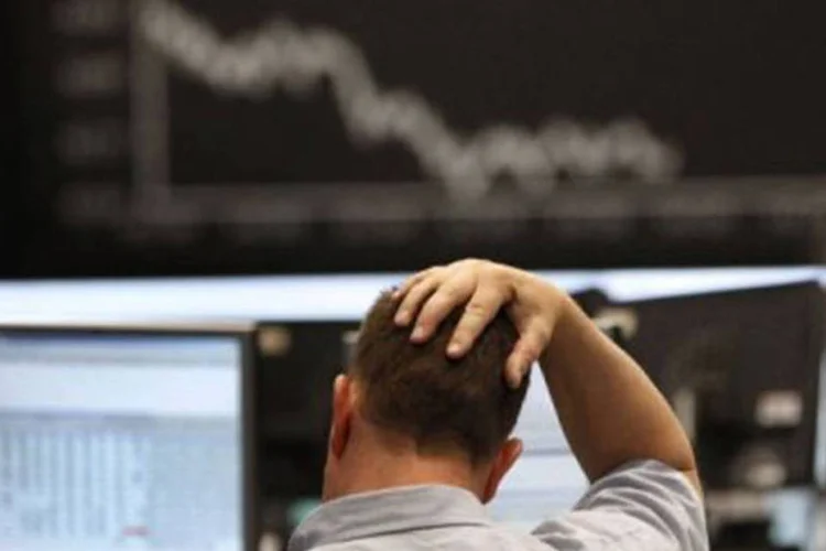 Bolsas no mundo inteiro desabaram ontem, eliminando US$ 2 trilhões em valor de mercado em uma semana (Mario Vedder/AFP)