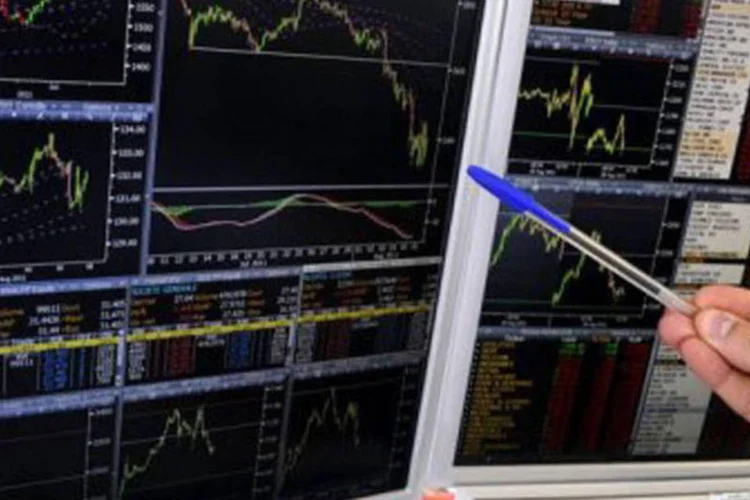 
	O &iacute;ndice Merval, da Bolsa de Com&eacute;rcio de Buenos Aires, retrocedeu 3,15%, para 3.237,06 pontos
 (Miguel Medina/AFP)