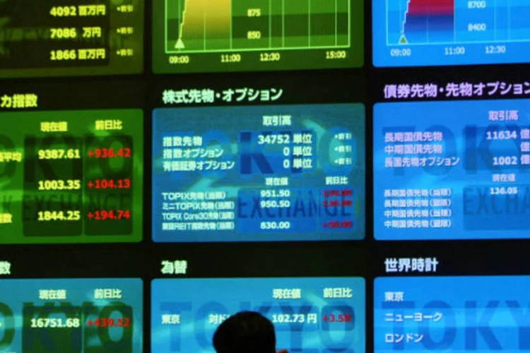 
	Bolsa de T&oacute;quio: o &iacute;ndice Nikkei avan&ccedil;ou 0,4%, para 11.606,38 pontos, ap&oacute;s ganhar 2,7% na sess&atilde;o anterior
 (Junko Kimura/Getty Images)