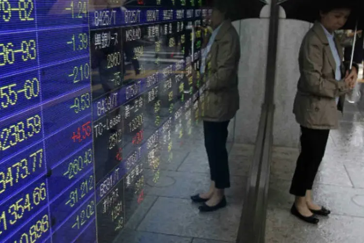 
	Bolsa de T&oacute;quio: o &iacute;ndice Nikkei encerrou com avan&ccedil;o de 1,8%, a 14.766,18 pontos
 (REUTERS/Yuya Shino)