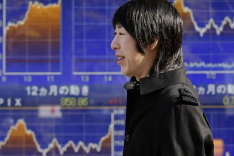 
	Bolsa de T&oacute;quio: o Nikkei avan&ccedil;ou 0,3%, para 11.968,08 pontos, ap&oacute;s uma alta de 2,1% na sess&atilde;o anterior
 (REUTERS/Yuriko Nakao)