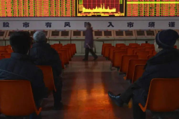
	Bolsa de Xangai: mercado de Xangai subiu 0,85%, maior n&iacute;vel desde maio de 2013
 (REUTERS/Stringer/Reuters)
