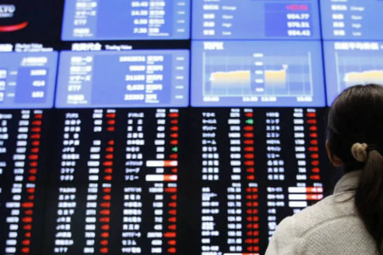 
	Bolsa de T&oacute;quio: a&ccedil;&otilde;es asi&aacute;ticas avan&ccedil;aram, com investidores cautelosos sobre a crise na Ucr&acirc;nia
 (REUTERS/Toru Hanai)