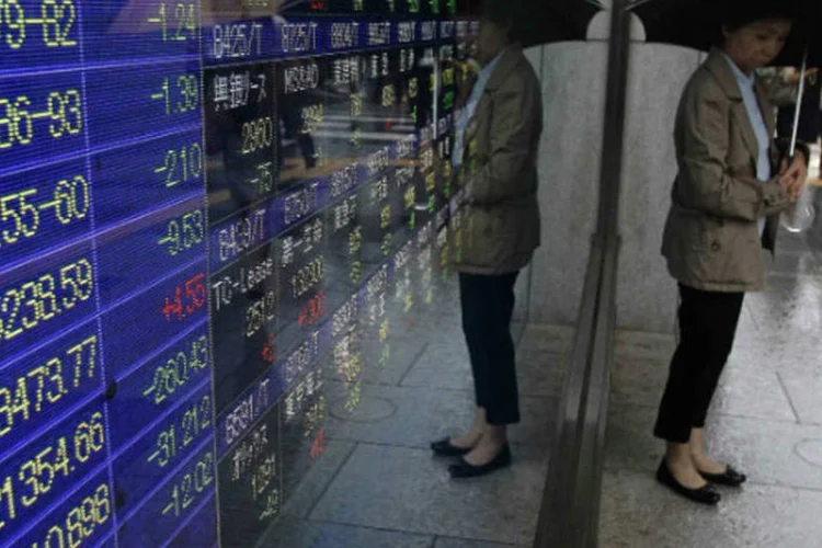 
	Bolsa de T&oacute;quio: &iacute;ndice japon&ecirc;s Nikkei foi contra a tend&ecirc;ncia, caindo 0,6 por cento por realiza&ccedil;&atilde;o de lucros
 (REUTERS/Yuya Shino)
