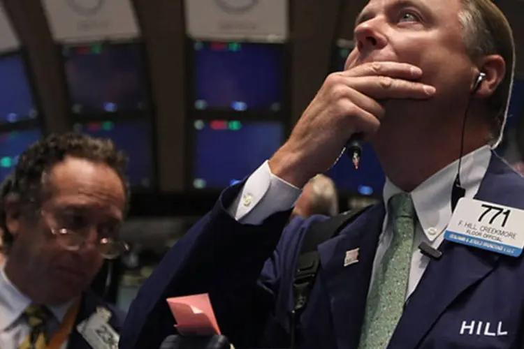 O índice Dow Jones caía 3,05%, o Nasdaq recuava 2,72% e o S&P 500 tinha queda de 2,80% (Getty Images)