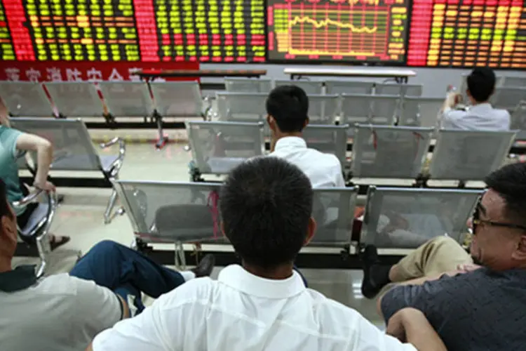 Bolsa de Xangai: apetite por risco dos investidores recuou depois da queda no volume de reservas cambiais da China (Getty Images/Getty Images)