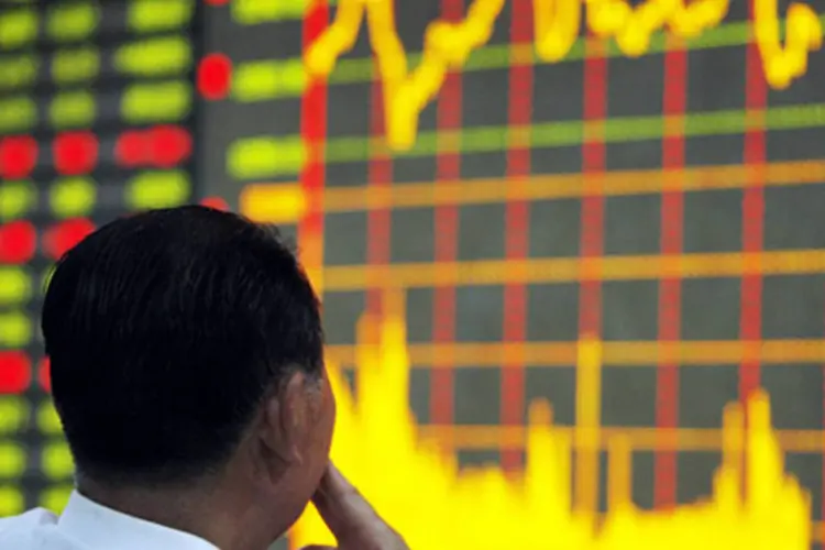 
	Bolsa de Xangai: na China, as bolsas tamb&eacute;m tiveram fortes quedas, no dia da abertura do Congresso do Partido Comunista
 (Getty Images/Getty Images)