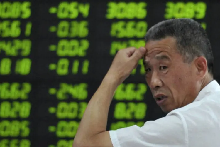 
	O &iacute;ndice Xangai Composto perdeu 2,8%, aos 2.084,02 pontos, o menor n&iacute;vel desde 13 de dezembro
 (REUTERS/China Daily)