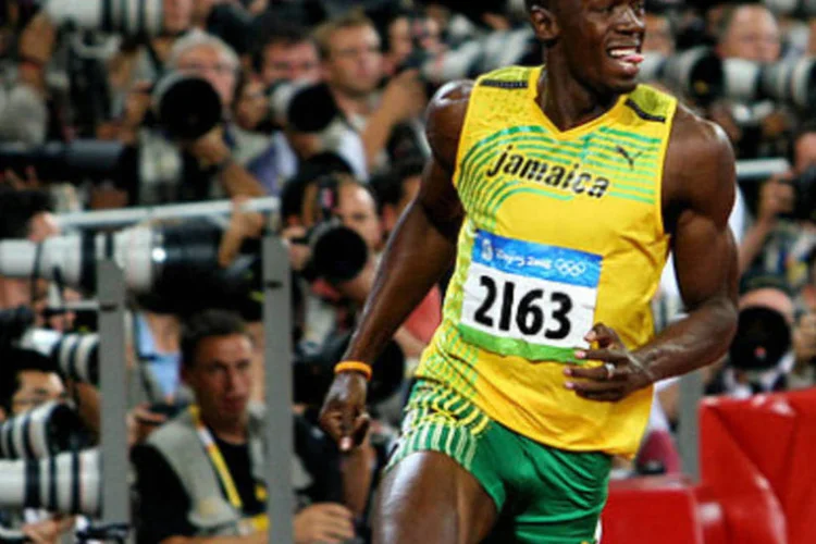 O jamaicano Usain Bolt comemora após vencer prova dos 100 metros