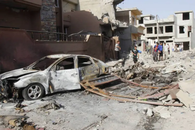 
	Carro-bomba no Iraque:&nbsp;com este atentado, subiu para 32 o n&uacute;mero de mortos hoje em atos violentos
 (Ako Rasheed/Reuters)