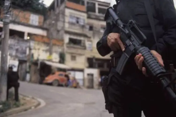 Policial do Bope em favela carioca: batalhão terá uma equipe de prontidão (.)