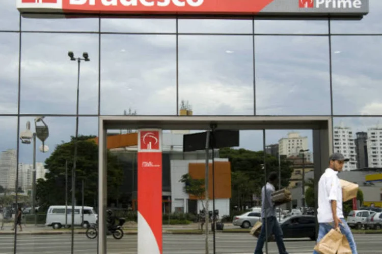 
	Ag&ecirc;ncia do Bradesco: no fim de mar&ccedil;o, a carteira de cr&eacute;dito do Bradesco somava cerca de 432,3 bilh&otilde;es de reais, avan&ccedil;o anual de 10,4 por cento
 (Paulo Fridman/Bloomberg)