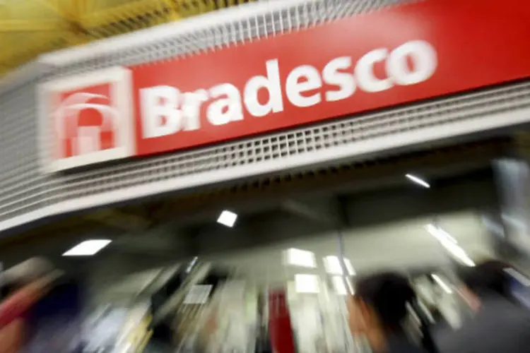 
	Bradesco: excluindo efeitos extraordin&aacute;rios, o lucro do grupo no per&iacute;odo somou 4,132 bilh&otilde;es de reais
 (Adriano Machado/Bloomberg News)