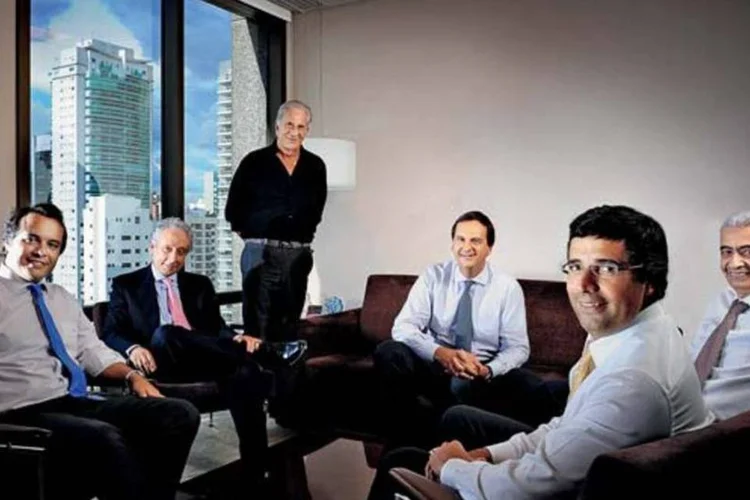 
	Executivos do banco BTG: companhia levantou cerca de 160 milh&otilde;es de d&oacute;lares em pap&eacute;is com vencimento em tr&ecirc;s anos
 (Germano Lüders/EXAME.com)