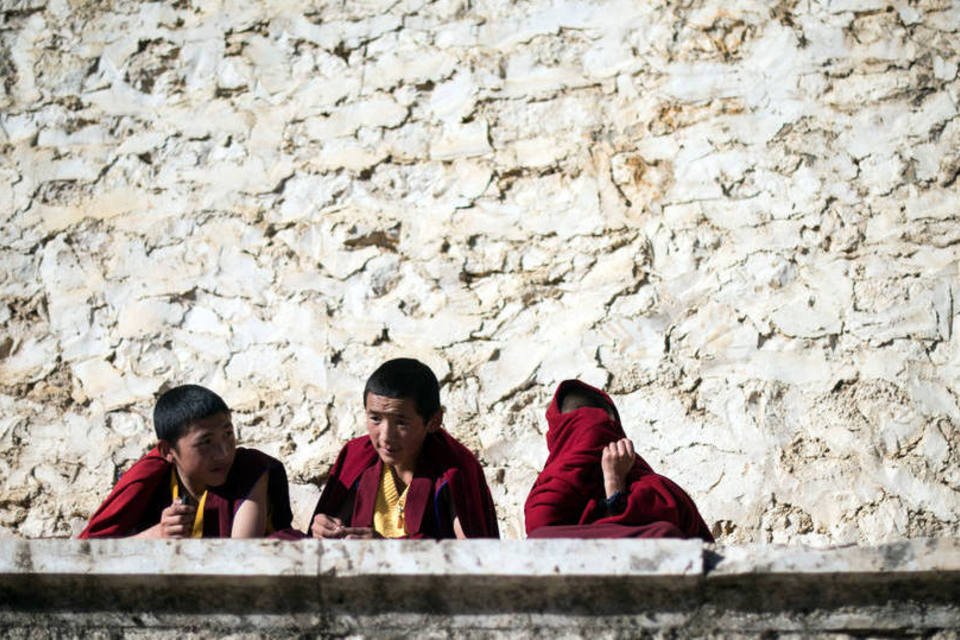 
	Budismo: os budas falsos &quot;amea&ccedil;aram a seguran&ccedil;a nacional ao usar dinheiro que colhem em atividades ilegais ou separatistas no Tibete&quot;
 (Johannes Eisele / AFP)