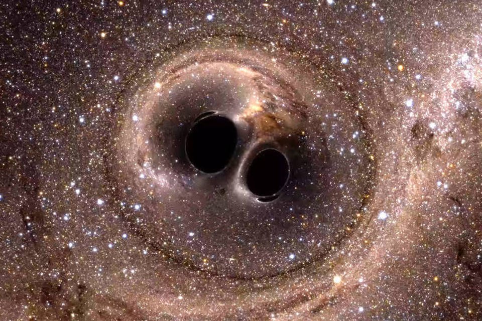 Buracos negros podem colidir entre si para formar um novo buraco negro com ondas gravitacionais ainda mais intensas (Reprodução/Reprodução)