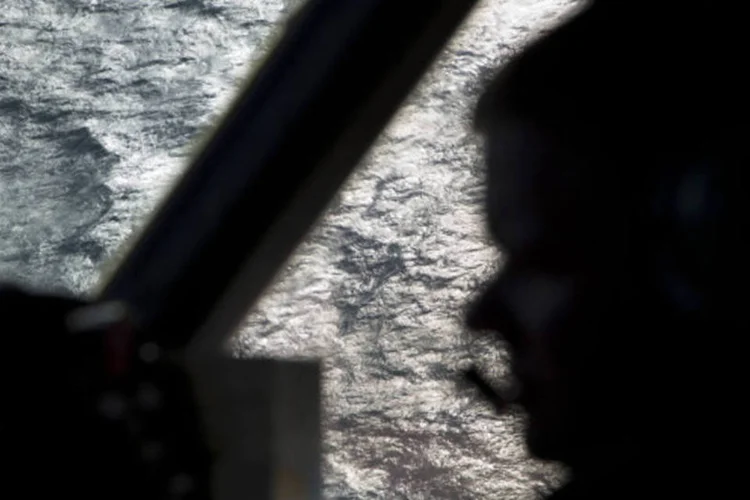 
	Avi&atilde;o procura destro&ccedil;os do voo MH370: avi&atilde;o da Malaysia Airlines desapareceu em 8 de mar&ccedil;o de 2014
 (Michael Martina/Reuters)
