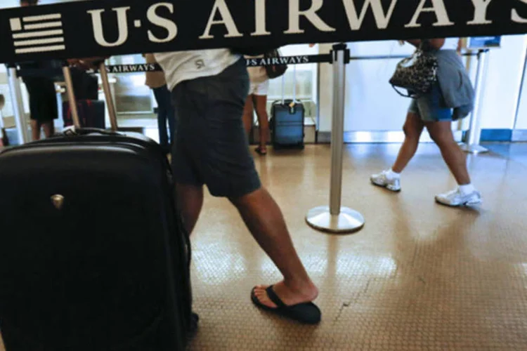 
	US Airways:&nbsp;voo 777 pousou em seguran&ccedil;a e sem incidentes ao seu destino por volta de 14h
 (Patrick T. Fallon/Bloomberg)