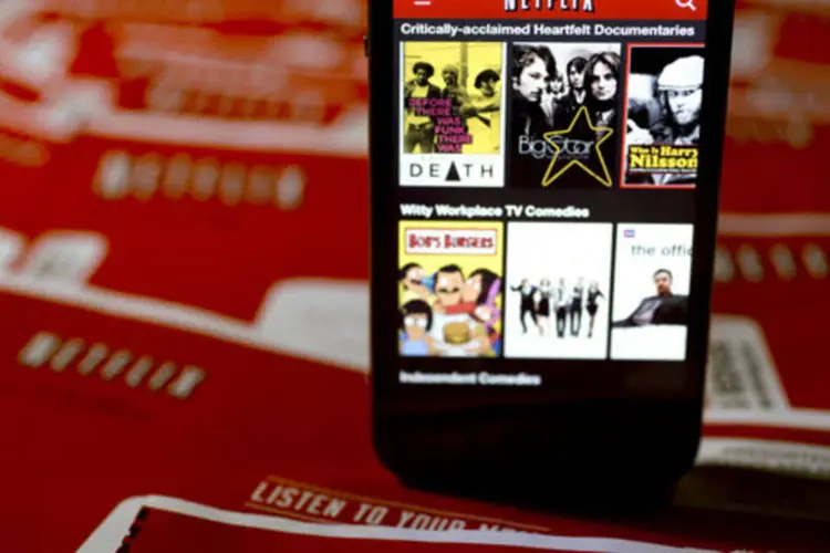 
	Aplicativo do Netflix &eacute; exibido em um iPhone, da Apple
 (Andrew Harrer/Bloomberg)