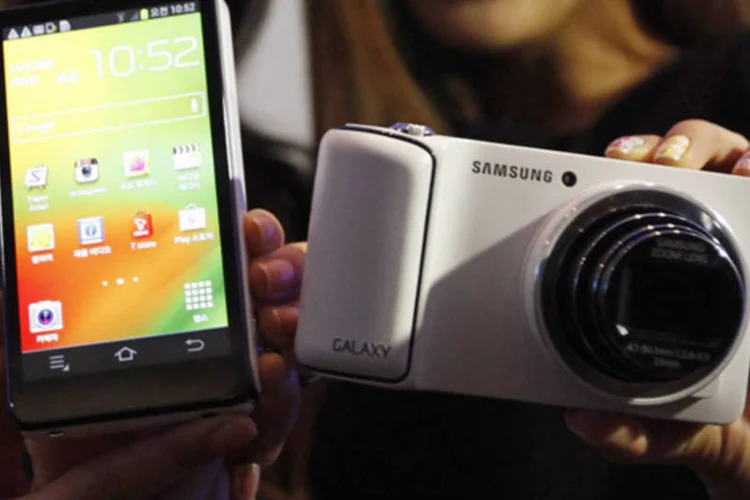 
	Embora n&atilde;o seja a primeira do mercado, poder de marketing da Samsung sugere que ela possa representar a maior amea&ccedil;a ao dom&iacute;nio japon&ecirc;s no setor de c&acirc;meras digitais
 (Kim Hong-Ji/Reuters)
