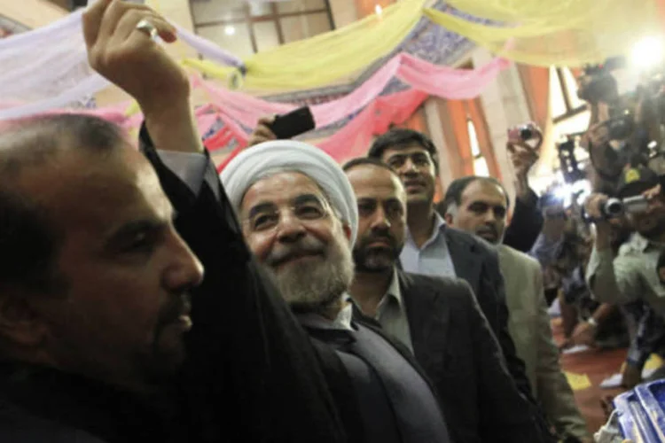 
	De acordo com resultados definitivos, Rohani, de 64 anos, obteve 18,6 milh&otilde;es de votos (50,68%), anunciou o ministro do Interior, Mostapha Mohammad Najjar
 (REUTERS/Yalda Moayeri)