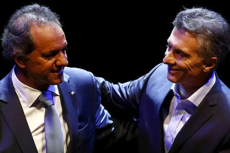 
	Scioli e Marci: para os analistas, as pol&iacute;ticas protecionistas da Argentina adotadas pelos governos kirchneristas dever&aacute; ser desmontada, seja qual for o resultado das elei&ccedil;&otilde;es
 (Marcos Brindicci / Reuters)