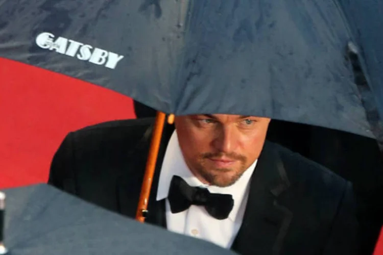 
	O ator Leonardo DiCaprio, protagonista do filme &quot;O grande Gatsby&quot;, chega para a abertura do Festival de Cannes
 (REUTERS/Loic Venance/)