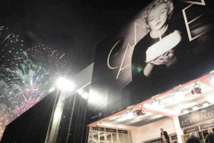 Essa foi a quarta vez da diretora brasileira em Cannes (©AFP / Anne-Christine Poujoulat)