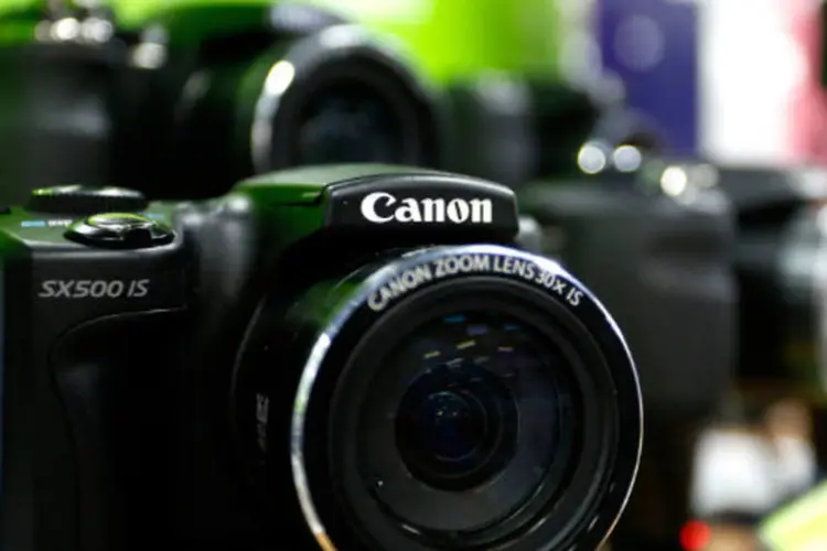 
	Canon: companhia elevou suas proje&ccedil;&otilde;es de lucro para o ano devido ao iene muito mais fraco
 (Paul Thomas/Bloomberg)