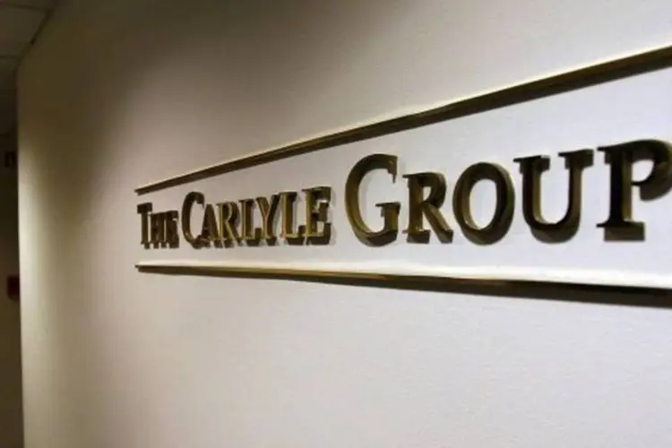 
	Grupo Carlyle: as a&ccedil;&otilde;es do Carlyle Group em Nova York ca&iacute;am 1,84% &agrave;s 12h00
 (Win McNamee/Getty Images)