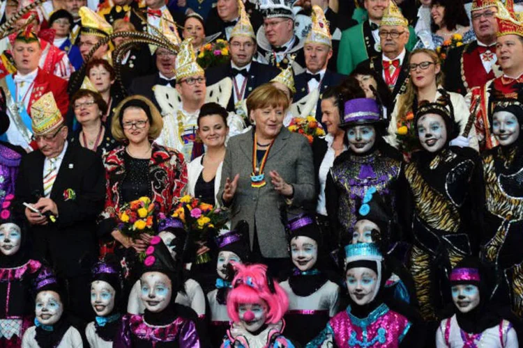 
	Carnaval: &quot;Apreciamos nossa liberdade, a liberdade de opini&atilde;o e, especialmente, a liberdade dos &#39;loucos&#39;&quot;, lembrou a chanceler alem&atilde;
 (John MacDougall / AFP)