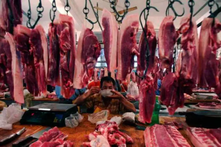 
	Venda na China: n&iacute;vel atual de consumo de carne tem impacto sobre a sa&uacute;de da sociedade e do meio ambiente.
 (China Photos / Stringer/Reuters)