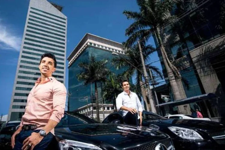 Revendedores da Monavie: Carneiro (à esq.) e Clemente têm 50 prestações do carro para pagar (Germano Lüders/EXAME.com)