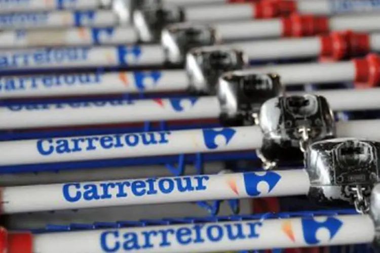 
	Carrinhos em uma das filiais do Carrefour: dar poderes a gerentes locais faz parte do esfor&ccedil;o iniciado por Georges Plassat para reanimar a monol&iacute;tica varejista
 (Philippe Huguen/AFP)