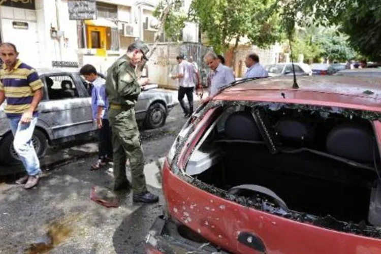 
	Destrui&ccedil;&atilde;o na S&iacute;ria: quase 20 pessoas morrem por dia por causa dos morteiros
 (Louai Beshara/AFP)