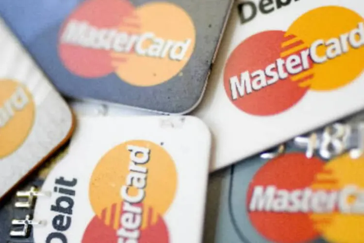 
	Cart&otilde;es Visa e Mastercard: no roubo de dados do sistema da Global Payments, 1,5 milh&atilde;o de cart&otilde;es Visa e Mastercard foram afetados
 (Andrew Harrer/Bloomberg)